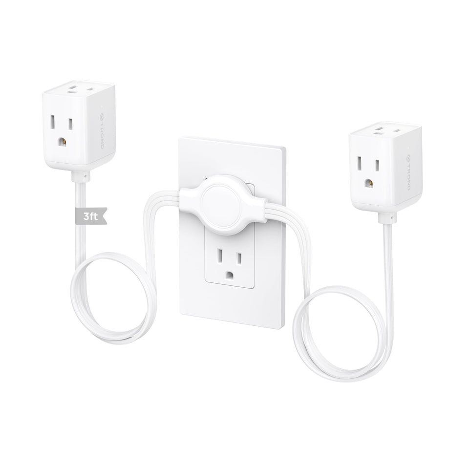 TROND split extension cord with flat wall plug behind a sofa, six outlets possible.