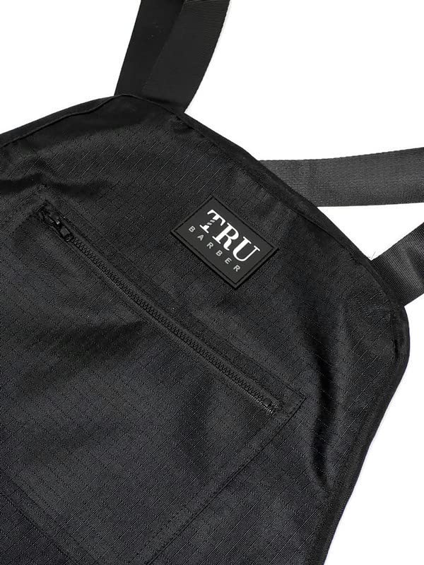 TRU BARBER apron with adjustable strap system for a comfortable fit.