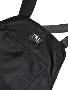 TRU BARBER apron with adjustable strap system for a comfortable fit.