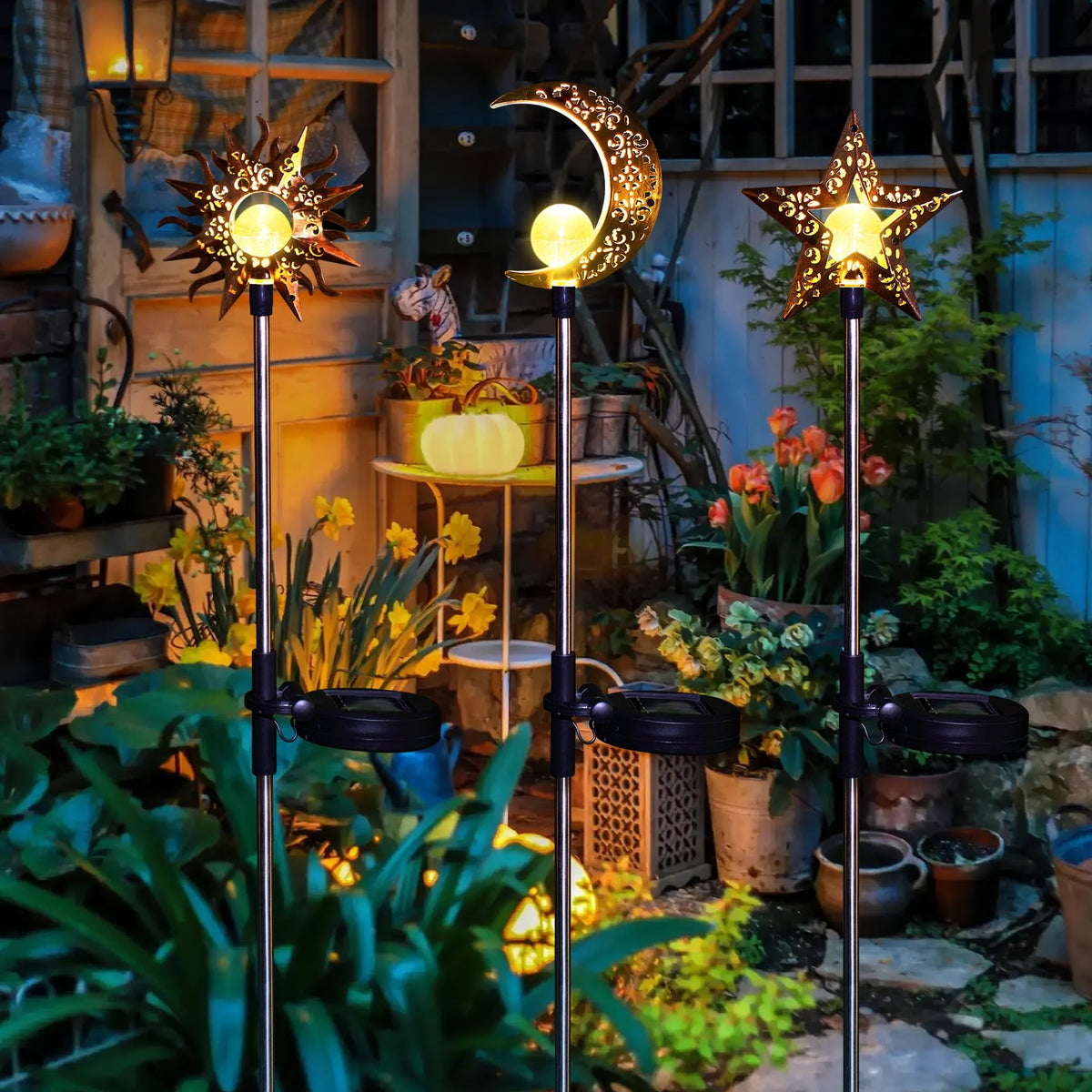 Tryme Star solar garden stake lights add a peaceful glow to flower beds
