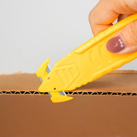 TTOVIA safety cutter with tape splitter nose for quick tape removal.
