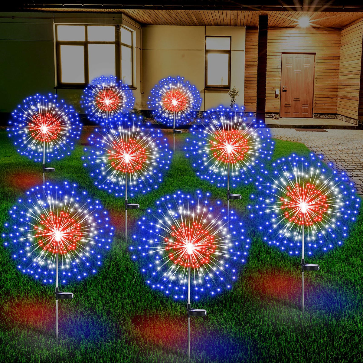 Tujoe 8-pack fourth of july solar firework stakes illuminate outdoor spaces with patriotic color.