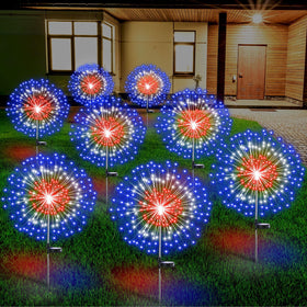 Tujoe 8-pack fourth of july solar firework stakes illuminate outdoor spaces with patriotic color.