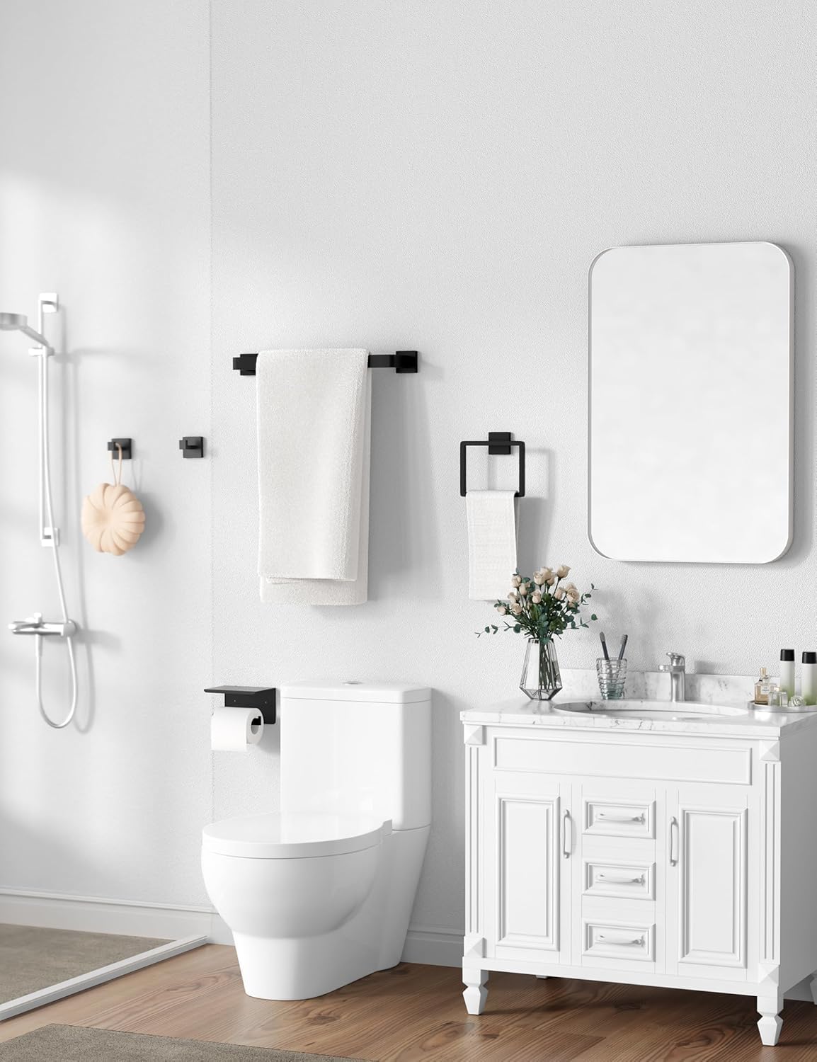 Tupello towel ring in matte black keeps hand towels neatly accessible.