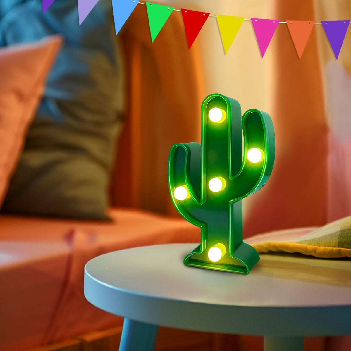 TurnMeOn cactus light enhances party photos with festive glow.