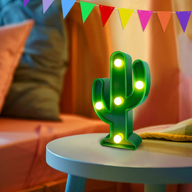 TurnMeOn cactus light enhances party photos with festive glow.