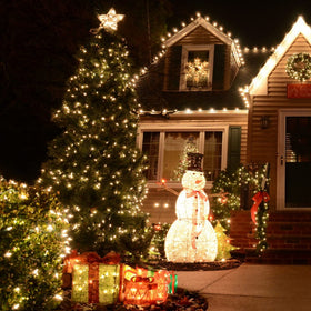 TW SHINE lights on a patio creating a cozy garden ambiance.