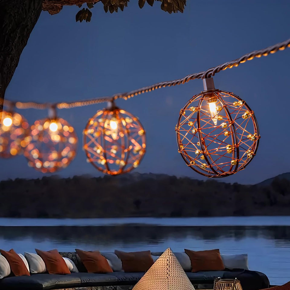TWINKVILLA outdoor lights with beaded copper balls provide a warm romantic glow for patios