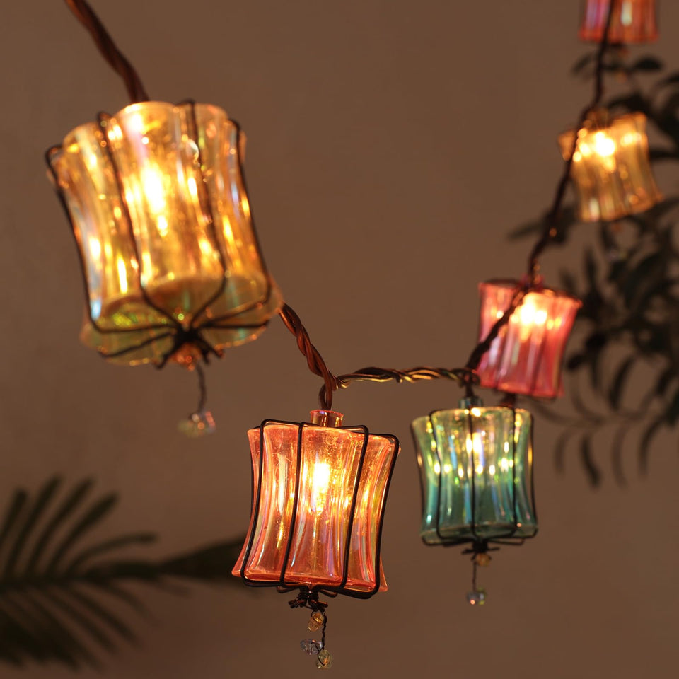TWINKVILLA outdoor string lights illuminate patios with 10 lantern bulbs for a cozy evening.