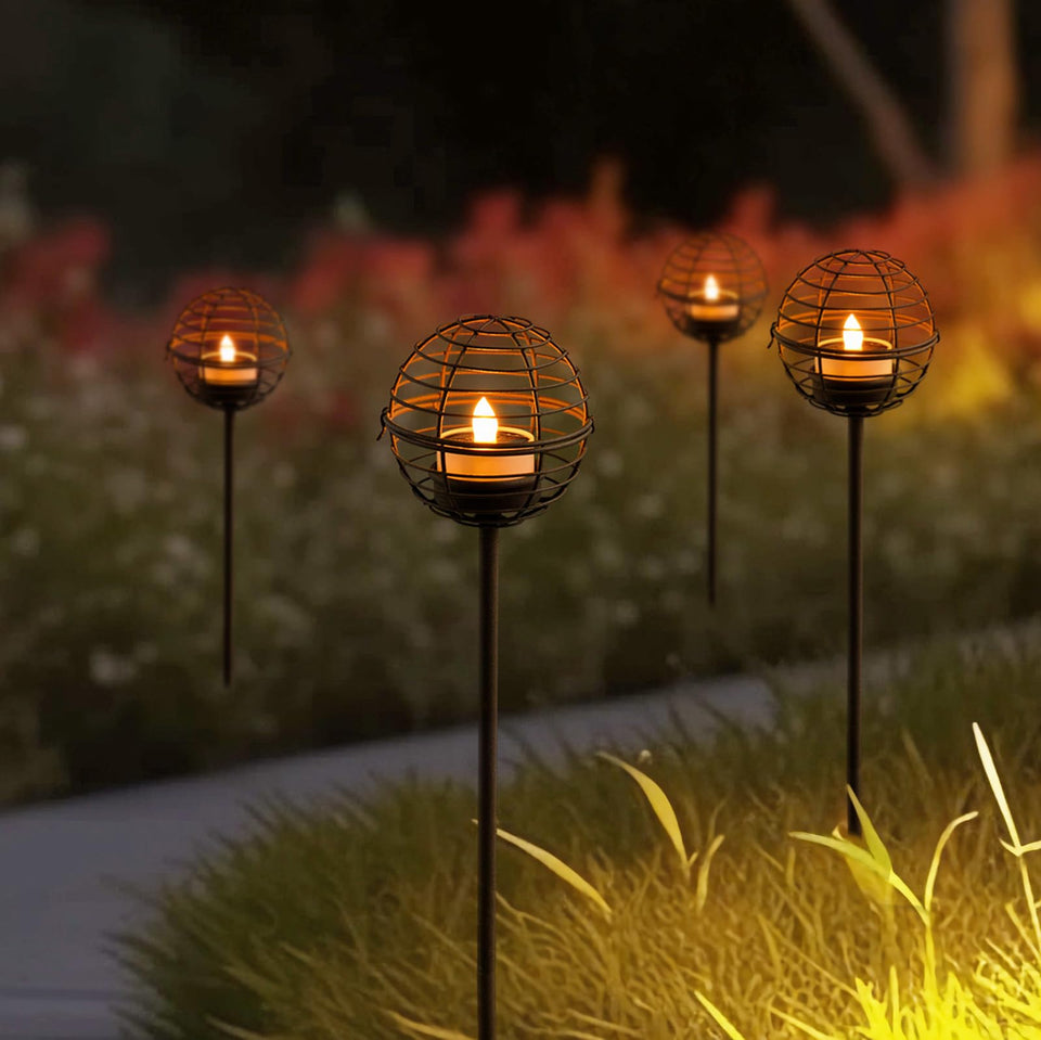 TWINKVILLA solar pathway lights with rust ball stake illuminate walkways warmly