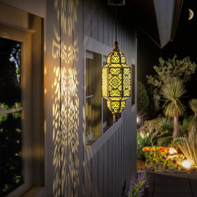 Twinkya Moroccan lantern gold hanging decor creates warm gatherings outdoors.