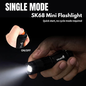 ULTRAFIRE compact pocket flashlight with anti-slip grip for secure handling.