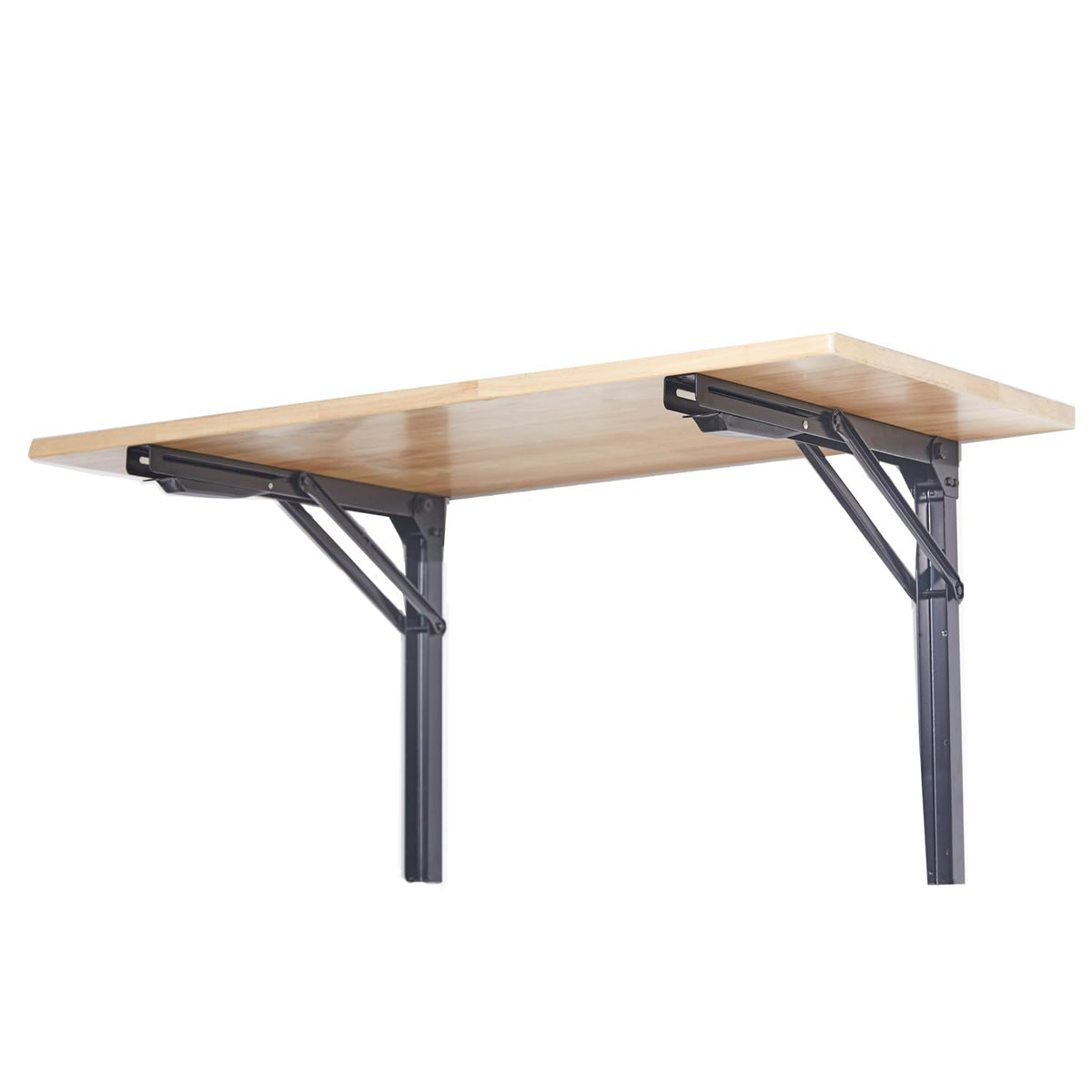 Ultrawall wall-mounted folding workbench in a garage supports up to 550 pounds.