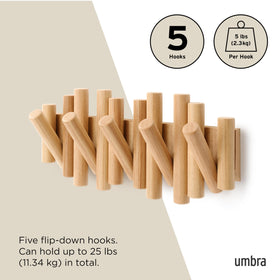 Umbra Picket supports up to five pounds per hook for daily items.