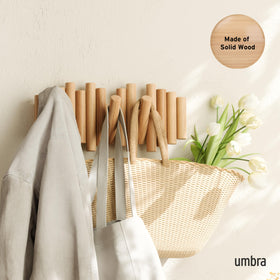 Umbra Picket five-flip-down hooks offer practical storage in entryways.