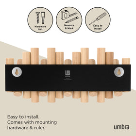 Umbra Picket helps keep coats, bags, and accessories organized.