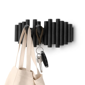 Umbra Picket wall-mounted coat rack with clean lines for organized entryways.