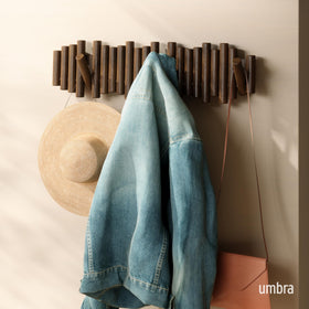Umbra Picket wall-mounted wood hooks folded-down design saves space when not in use.