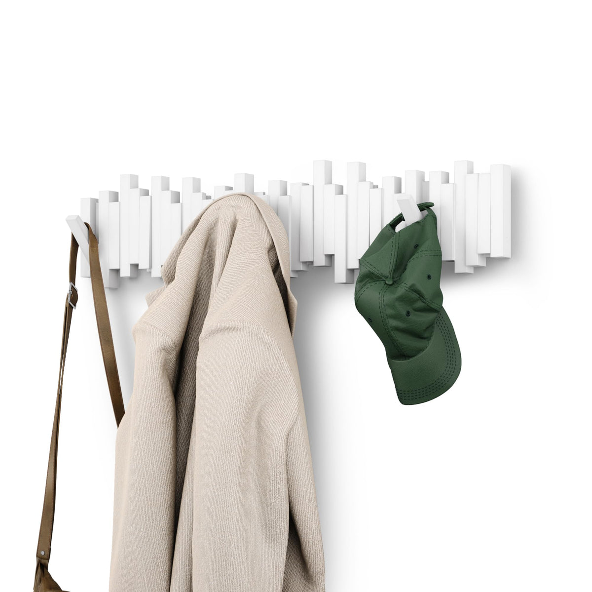 Umbra Sticks wall-mounted coat rack with eight flip-down hooks for organized entryways.