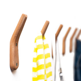 UMZi beech wood wall hooks, 2-pack, sturdy for coats and bags.