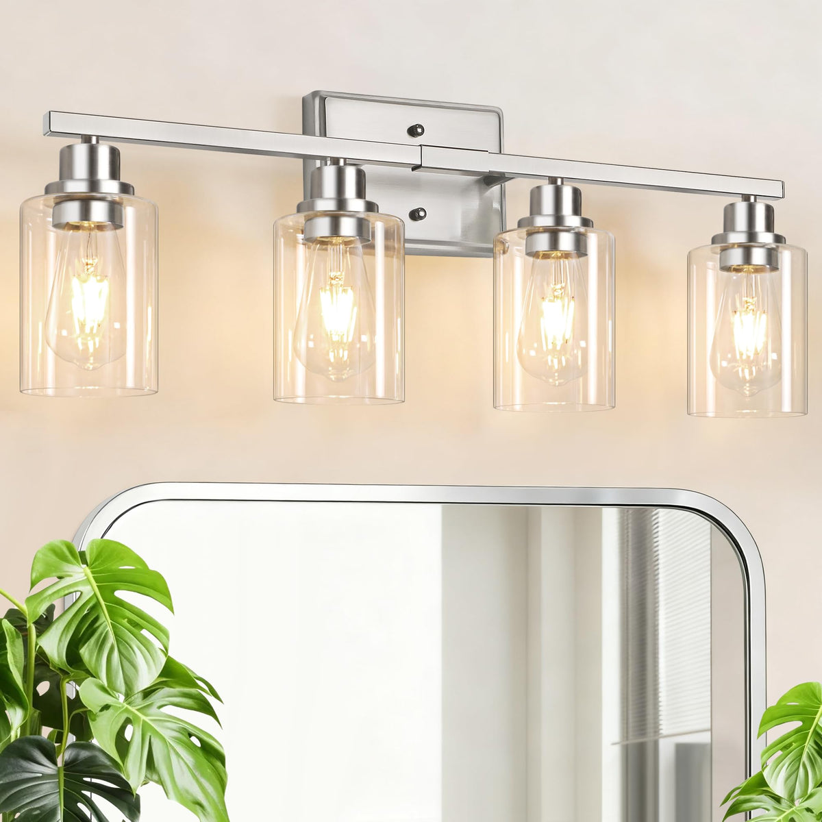 Unicozin 4-light bathroom fixture with brushed nickel finish illuminates vanity areas.