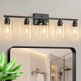 Unicozin 5-light vanity fixture over mirror provides bright, even illumination for grooming tasks.