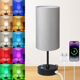 Unicozin table lamp with grey shade on nightstand for warm to cool ambient lighting.