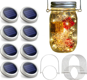 Urvoix solar mason jar lights hanging to create warm garden ambience.