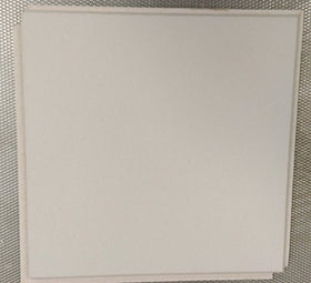 USG Interiors no-texture ceiling tile 12x12 with a clean smooth finish.