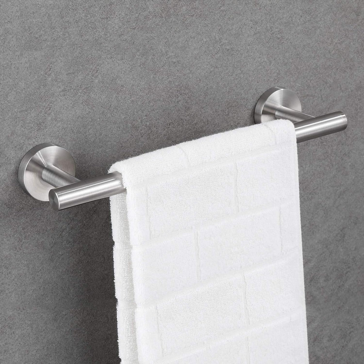 Detail of brushed nickel finish on towel bar adds refined detail.