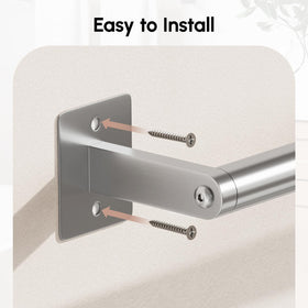 Modern brushed nickel finish complements neutral bathroom walls