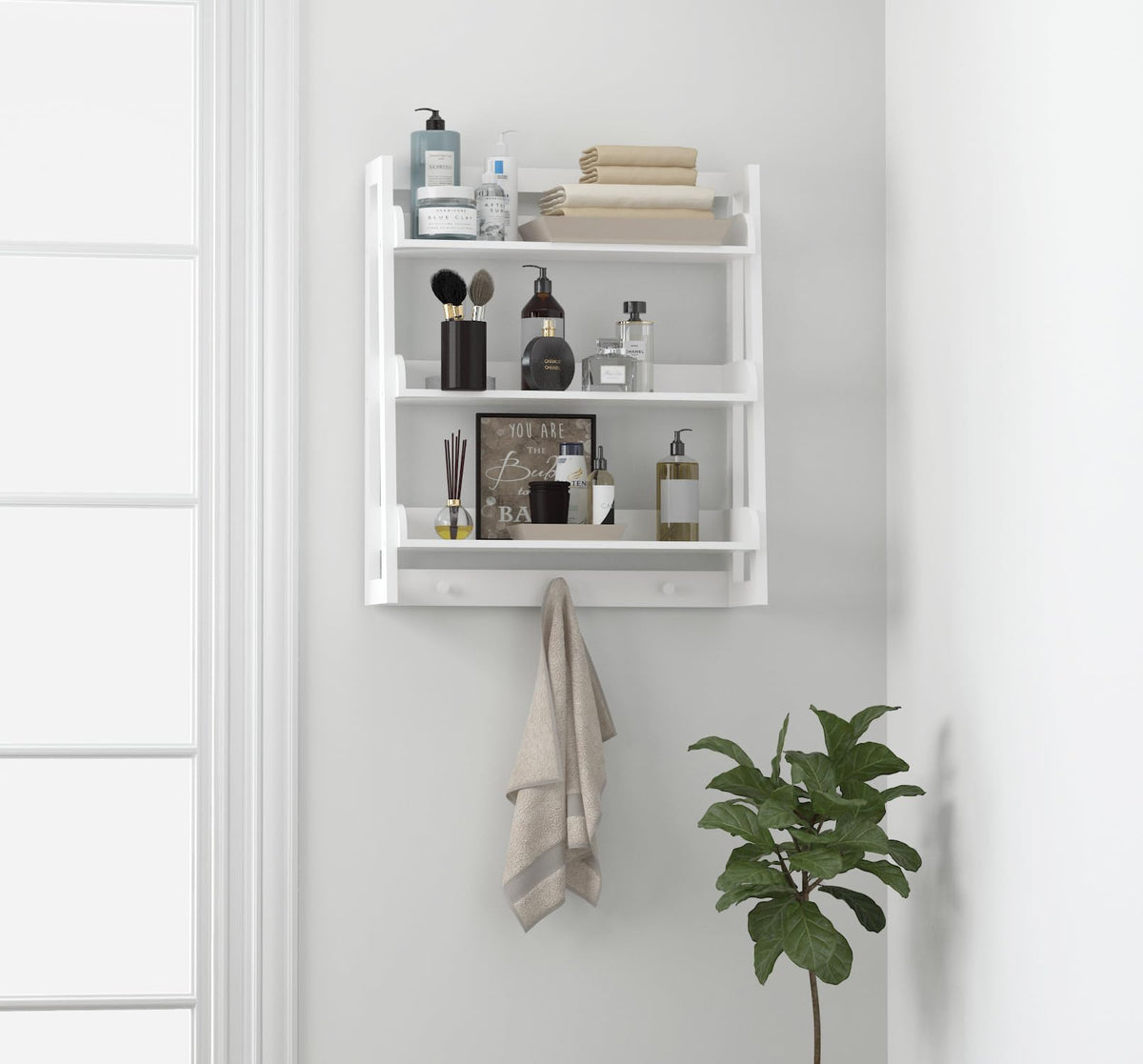 UTEX wall shelf with hooks organizes towels and robes.