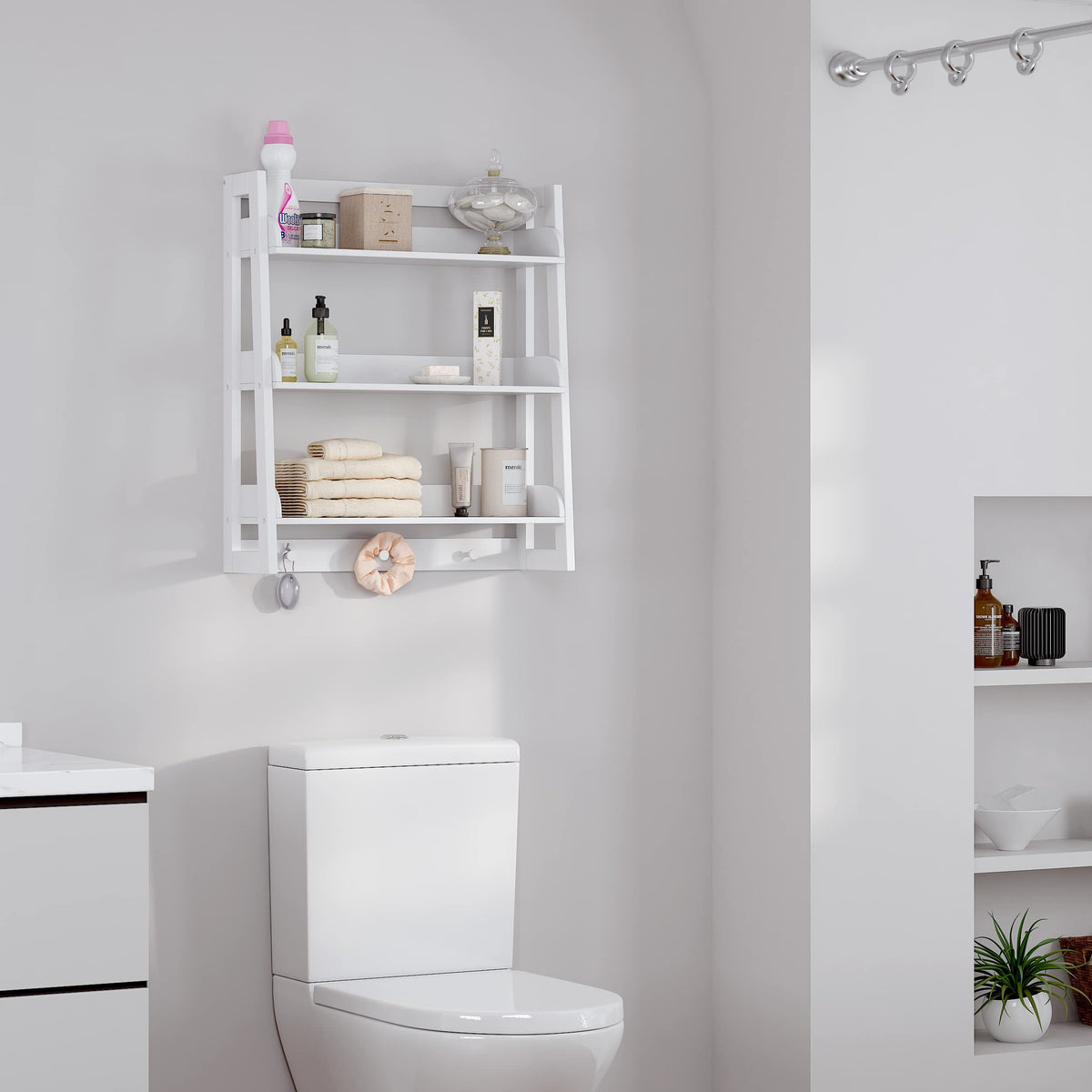 UTEX white wall-mounted shelf provides sturdy bathroom storage.