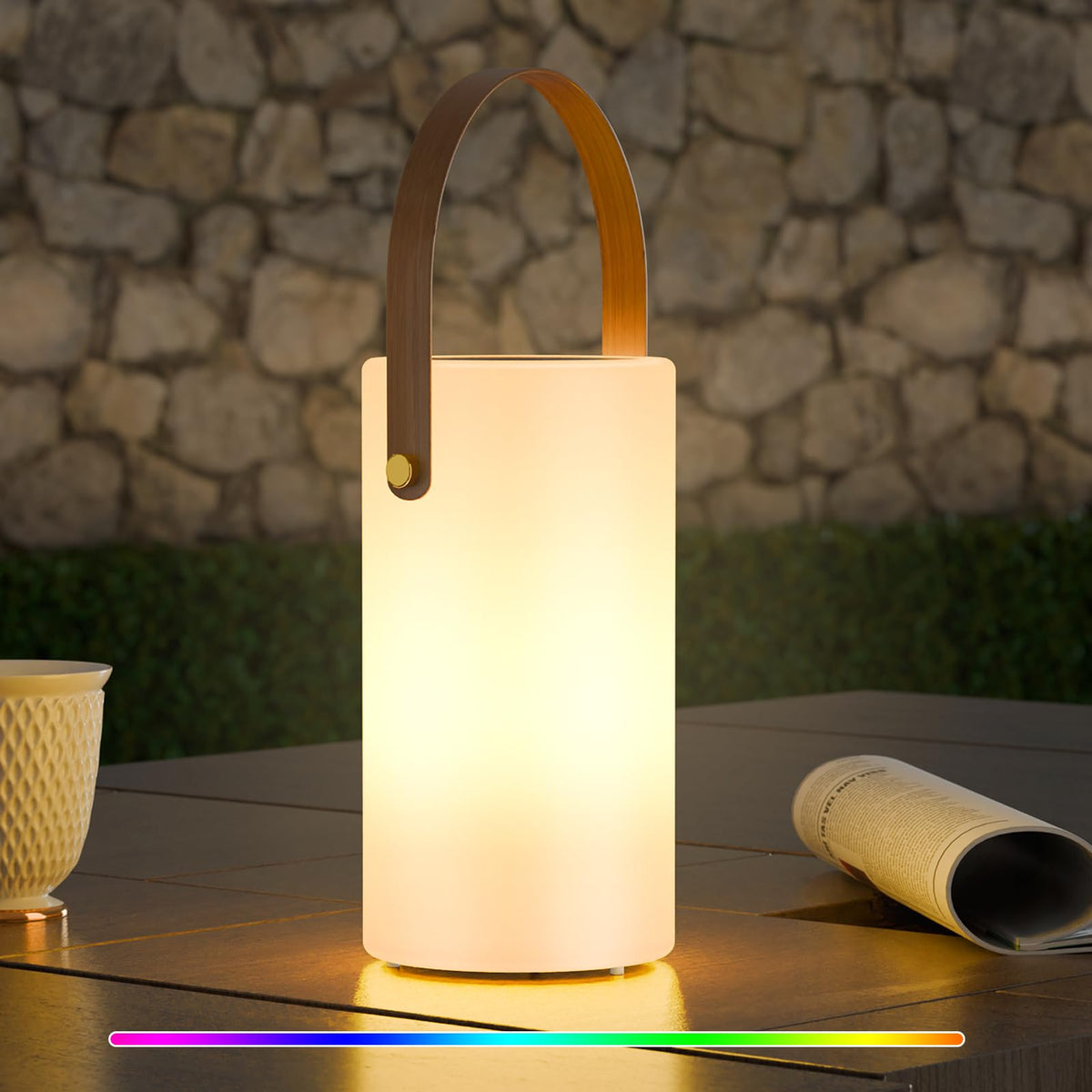 Uuffoo solar table lamp outdoors on patio providing a cozy glow