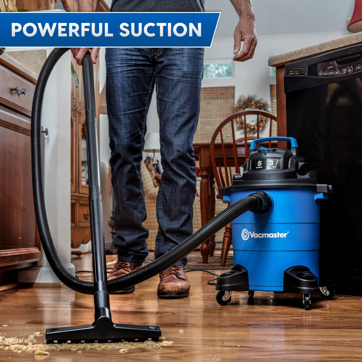 Vacmaster demonstrates 16-foot reach for hard-to-reach messes.