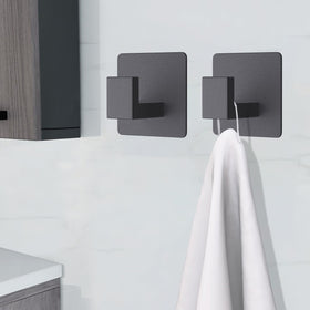 VAEHOLD kitchen hooks securely hang utensils on tiles.