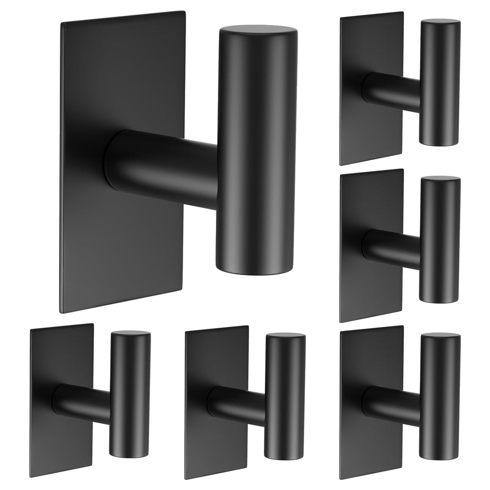 VAEHOLD wall towel hooks on a black finish keep towels and coats organized.