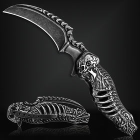 Valhalla Reaper skull knife with hollow motif for secure grip.