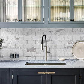 Vamos Tile 100-piece pack covers about 12.08 square feet for kitchen or bath projects.