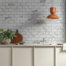 Vamos Tile dark gray grout strip shows modern contrast for bathroom and kitchen surfaces.