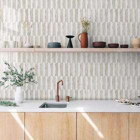 Vamos Tile fish-scale mosaic in gold adds a luxe wall accent.