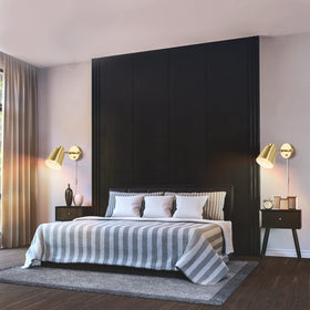 VATONI brushed brass finish enhances bedroom and stairs lighting