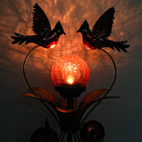 VCUTEKA Cardinal stake automatically lights up at dusk after charging.