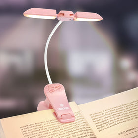 Vekkia 14-LED book light clips on for clear, eye-care reading in bed.
