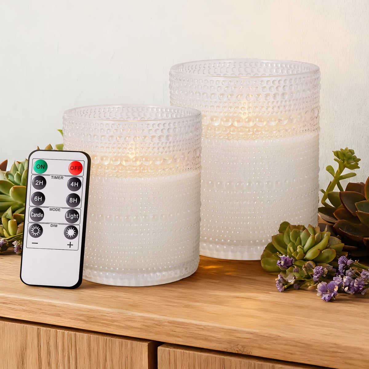 Velsyn dotted glass flameless candle 3x4, front view, provides warm, safe ambiance.
