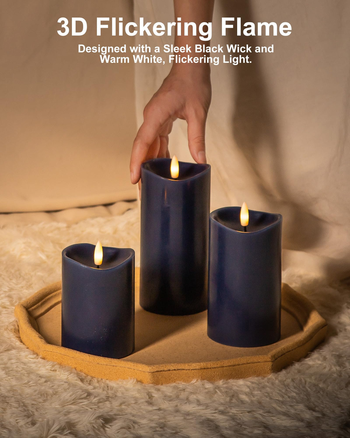 Set of three navy blue candles in 4, 5, and 6-inch heights by Velsyn.