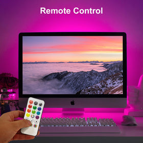 Velted RGB Light Bar USB powered setup beside a computer.