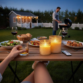 VENTA remote control lets you adjust candles from across the room for easy mood shifts.