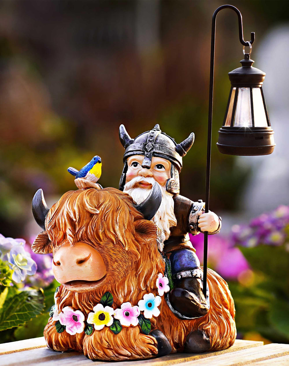 Vereemy garden gnome on Highland cow with solar lantern for illuminated outdoor spaces