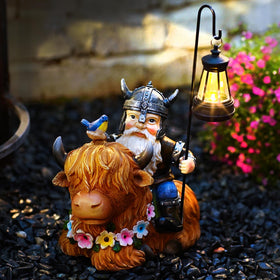 Highland cow garden statue as a whimsical gift idea for moms and friends